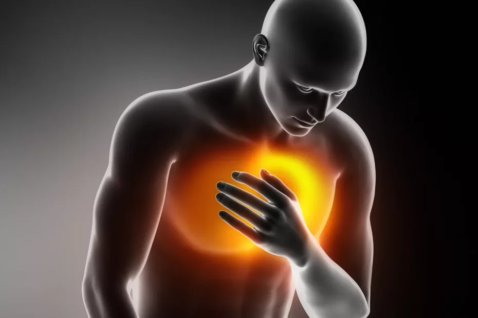 santé cardiaque et marathon : image d'un homme se mettant la main sur le coeur